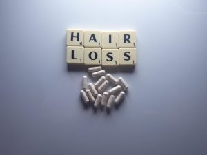 Hair Loss spelt in letter tiles